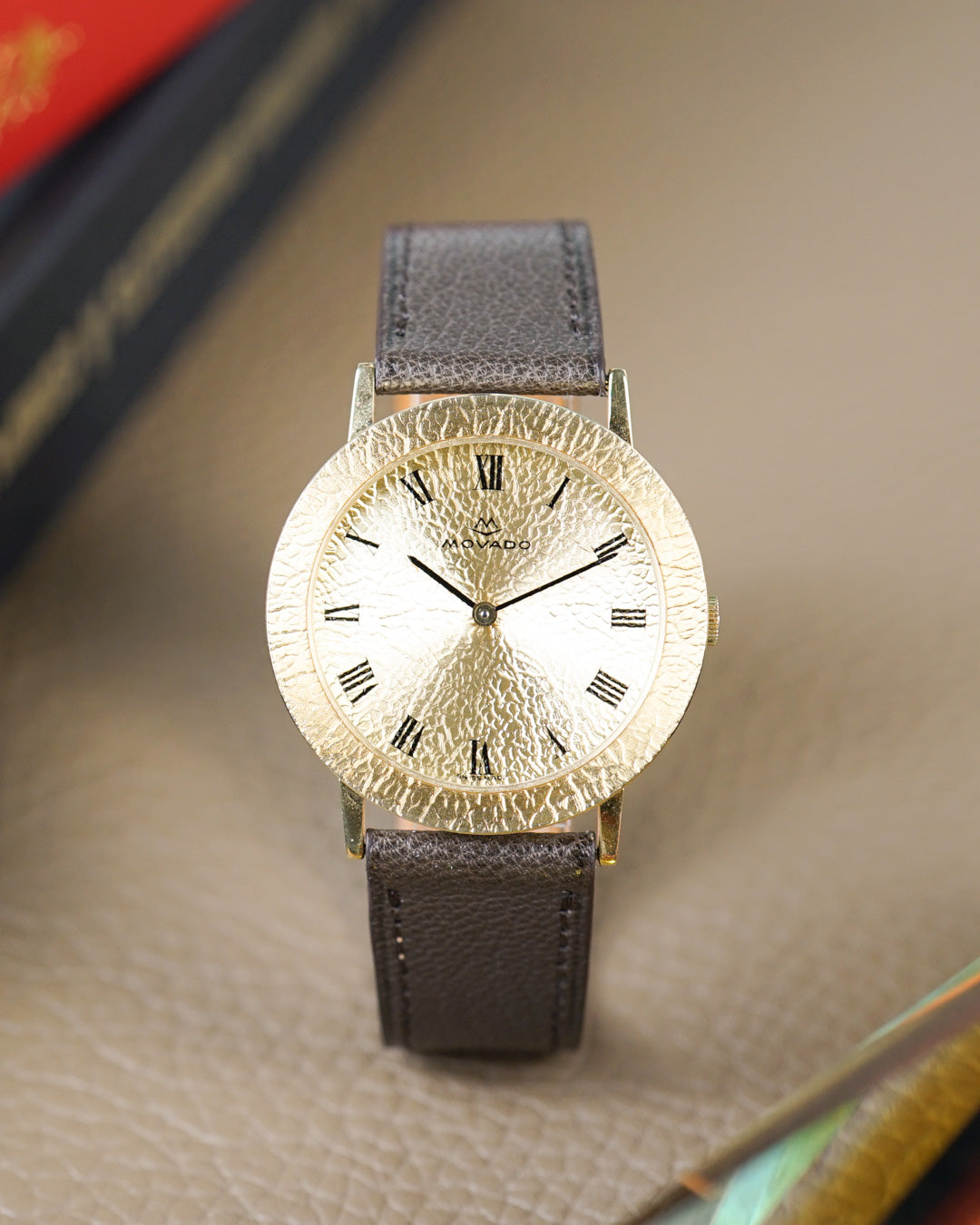 Movado "Gold Nugget" — hammered gold dial and bezel, 36mm, mint condition