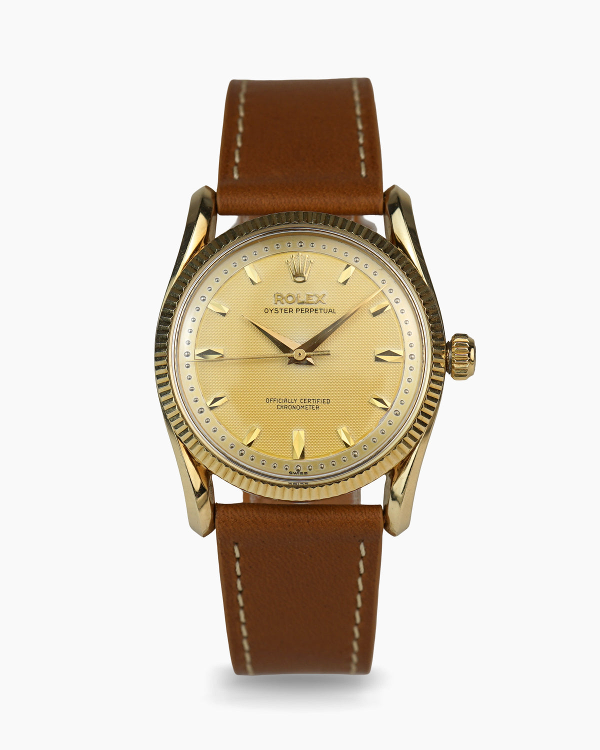 Rolex Oyster Perpetual reference 6593 in yellow gold — waffle dial, exceptional condition