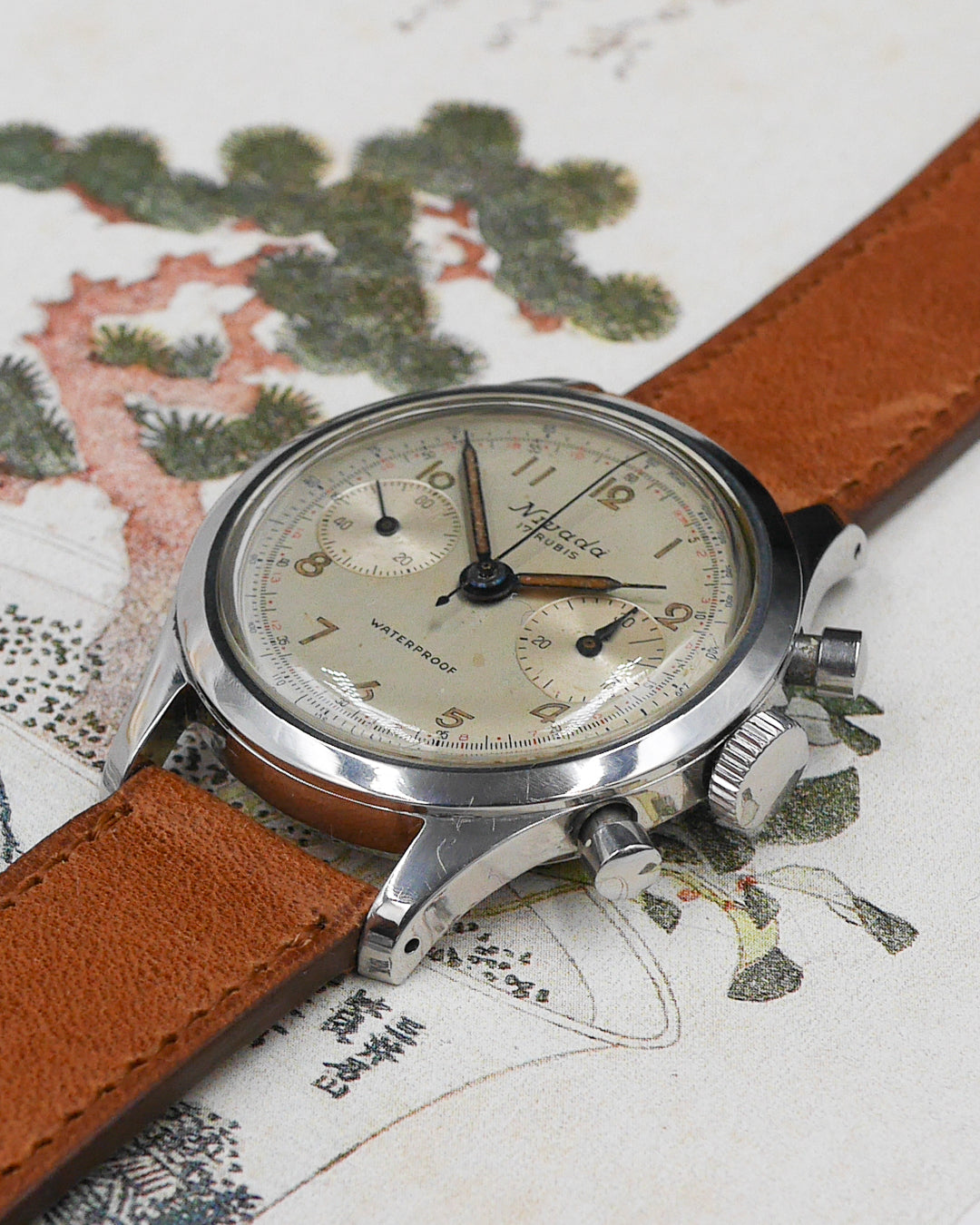 1940s Nivada clamshell case chronograph