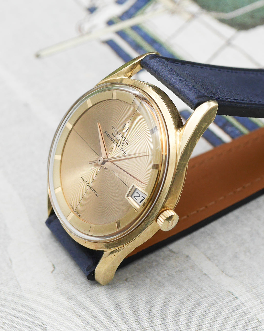 1960s Universal Geneve Polerouter in 18kt gold and rare guilloch? dial