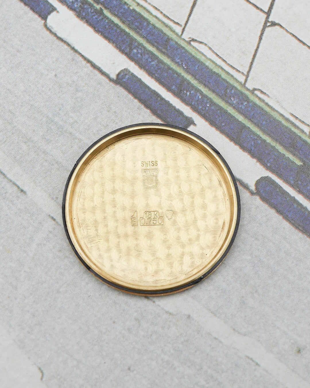 1960s Universal Geneve Polerouter in 18kt gold and rare guilloch? dial