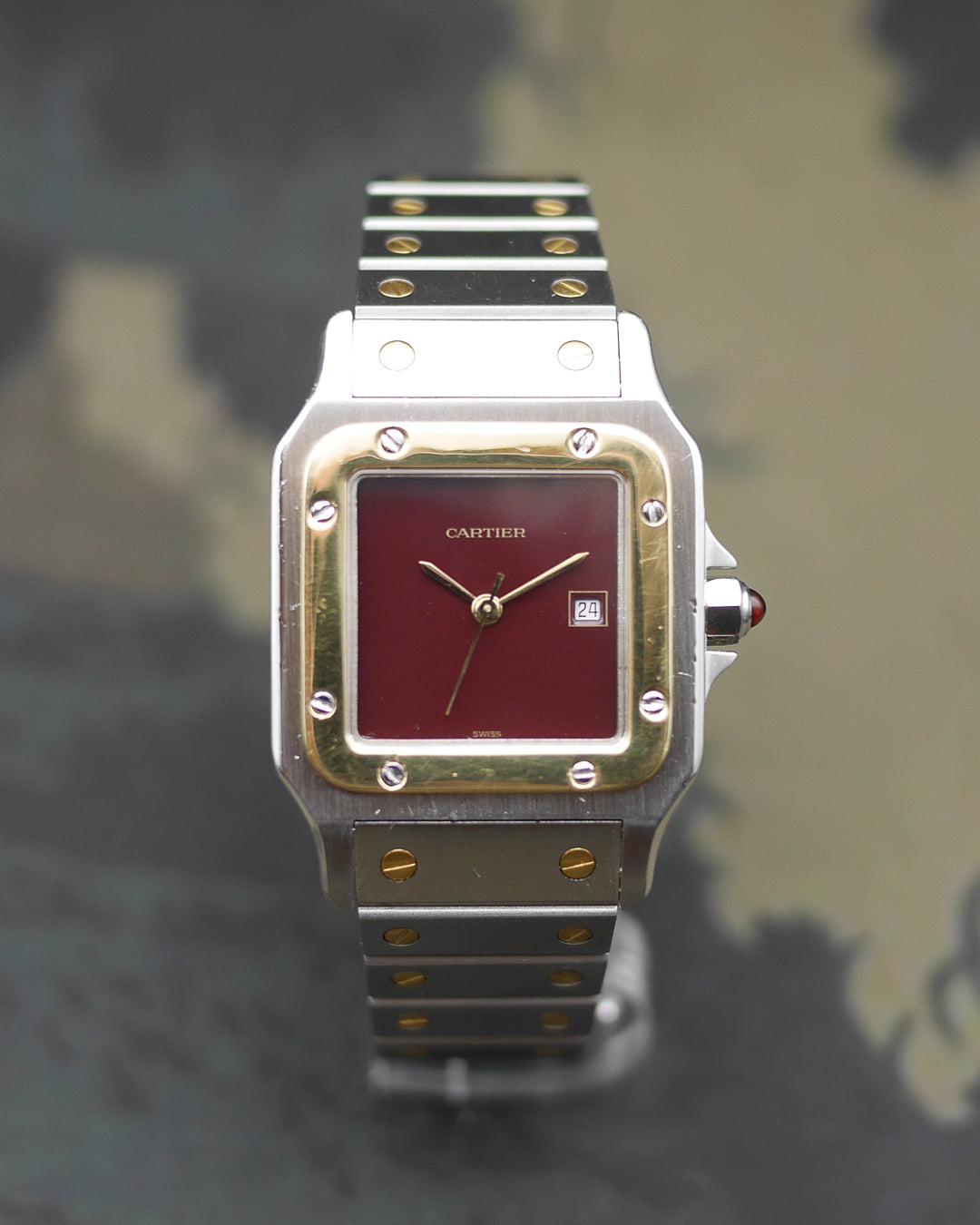 1980s Cartier Santos yellow gold & steel and its rare "bordeaux" dial and saphyr