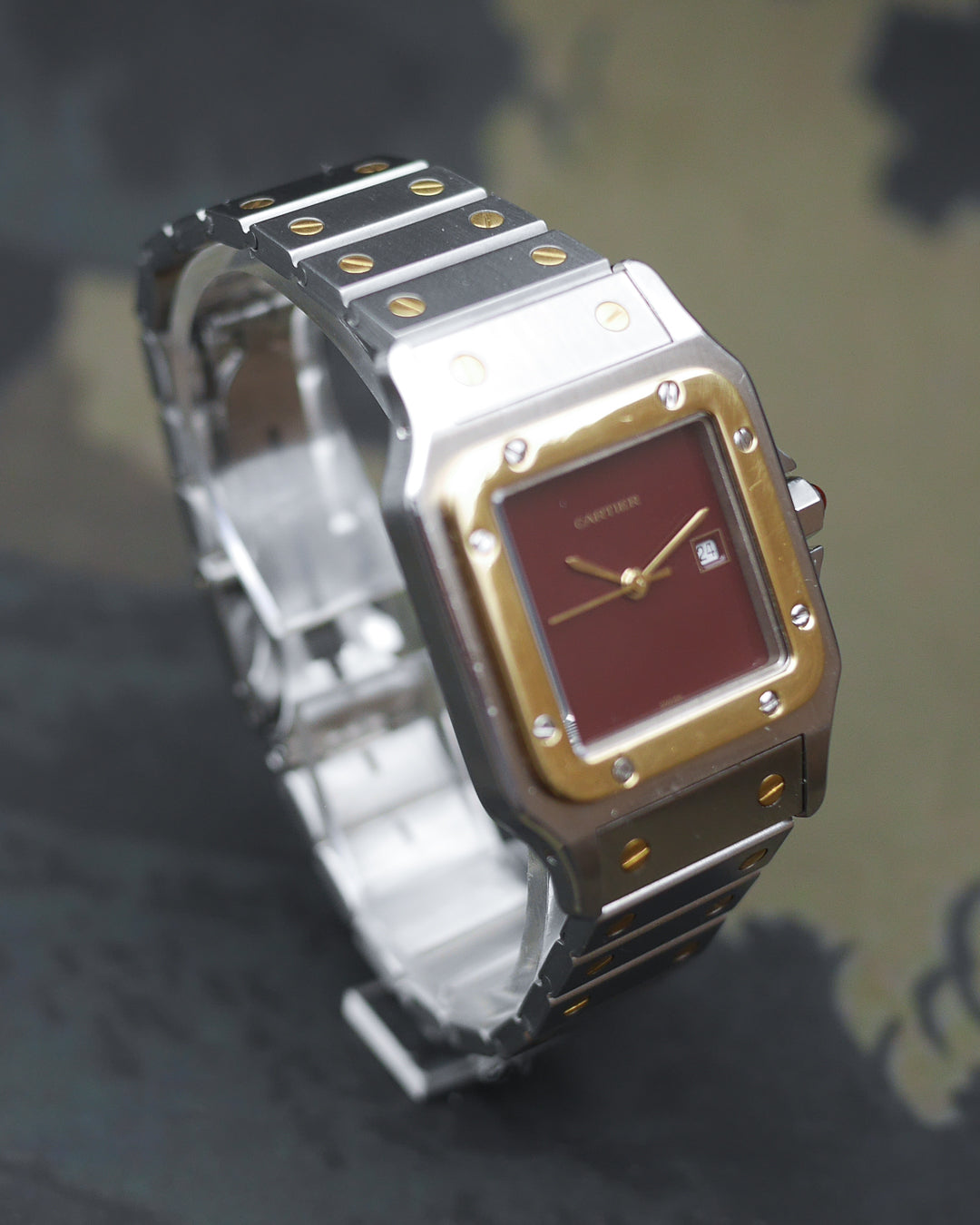 1980s Cartier Santos yellow gold & steel and its rare "bordeaux" dial and saphyr