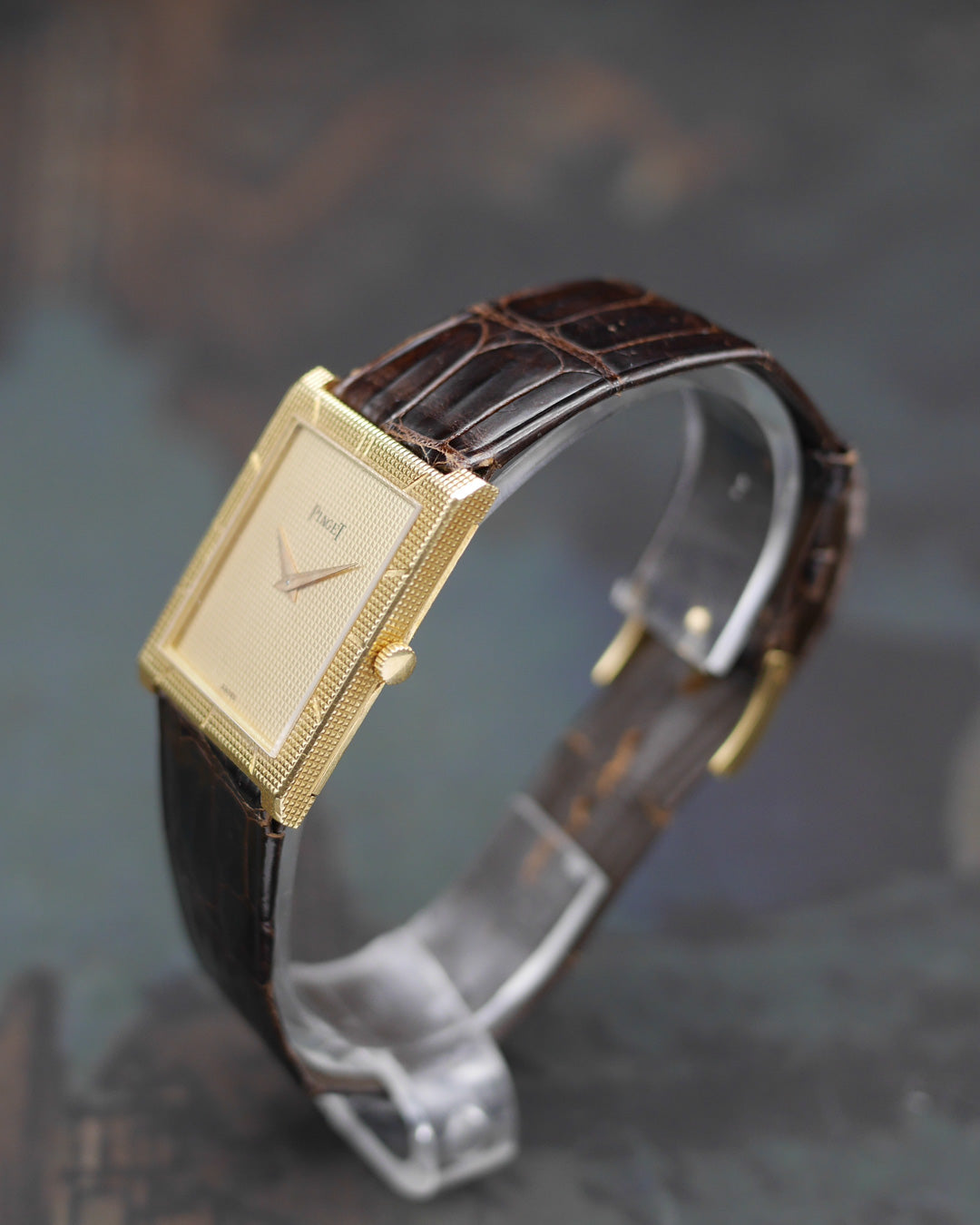 1970s Piaget "Clous de Paris" in 18kt yellow gold with its original strap