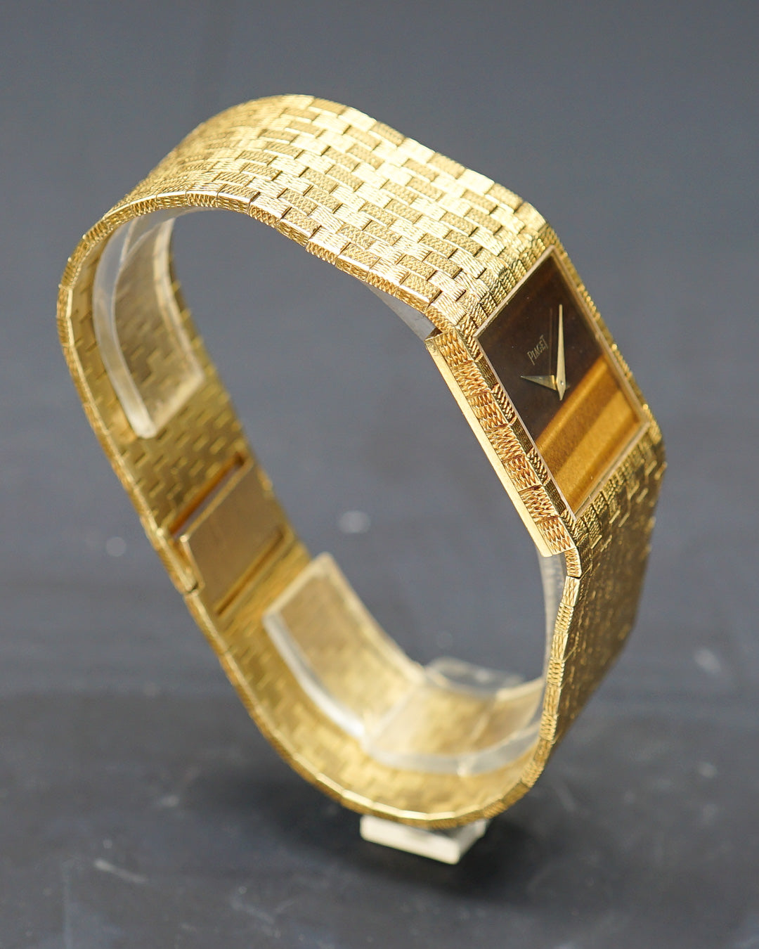 1970s Piaget oversized band watch with eye-of-tiger dial