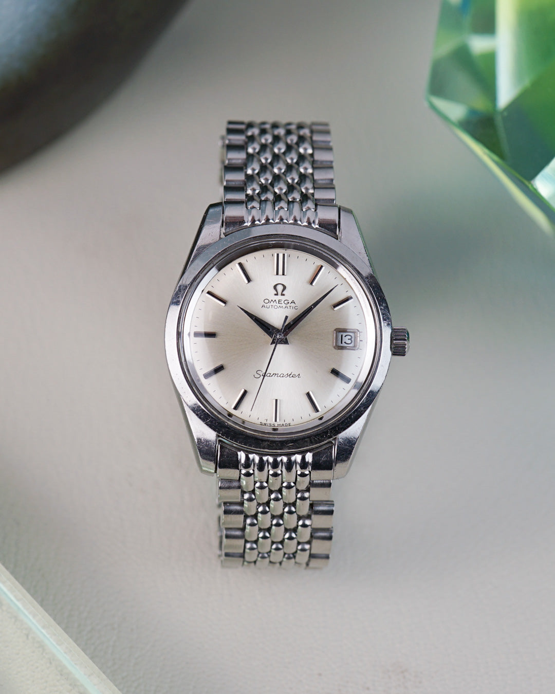 Omega Seamaster référence 166.010 cadran argenté, avec bracelet d'origine