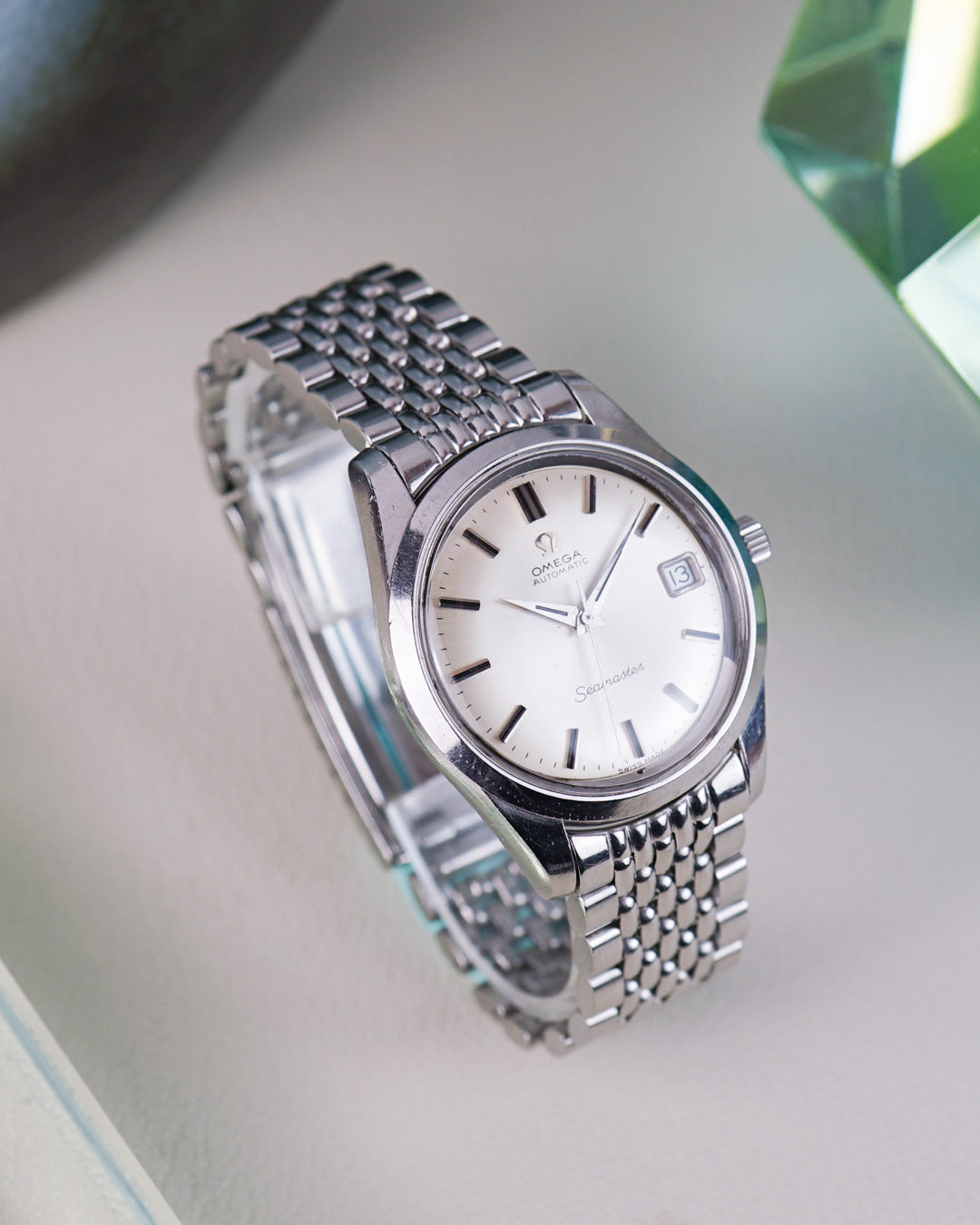 Omega Seamaster référence 166.010 cadran argenté, avec bracelet d'origine