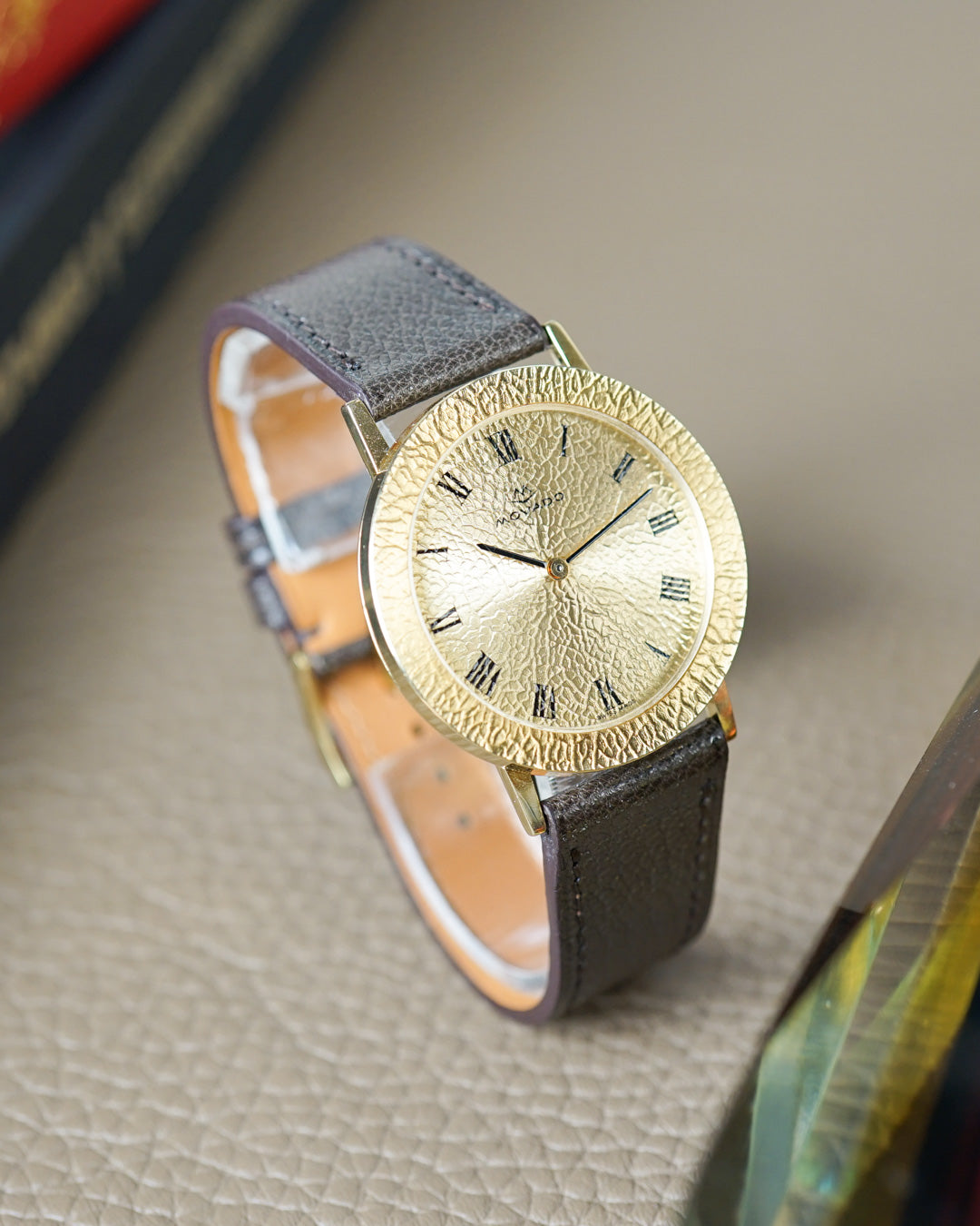 Movado "Gold Nugget" — hammered gold dial and bezel, 36mm, mint condition