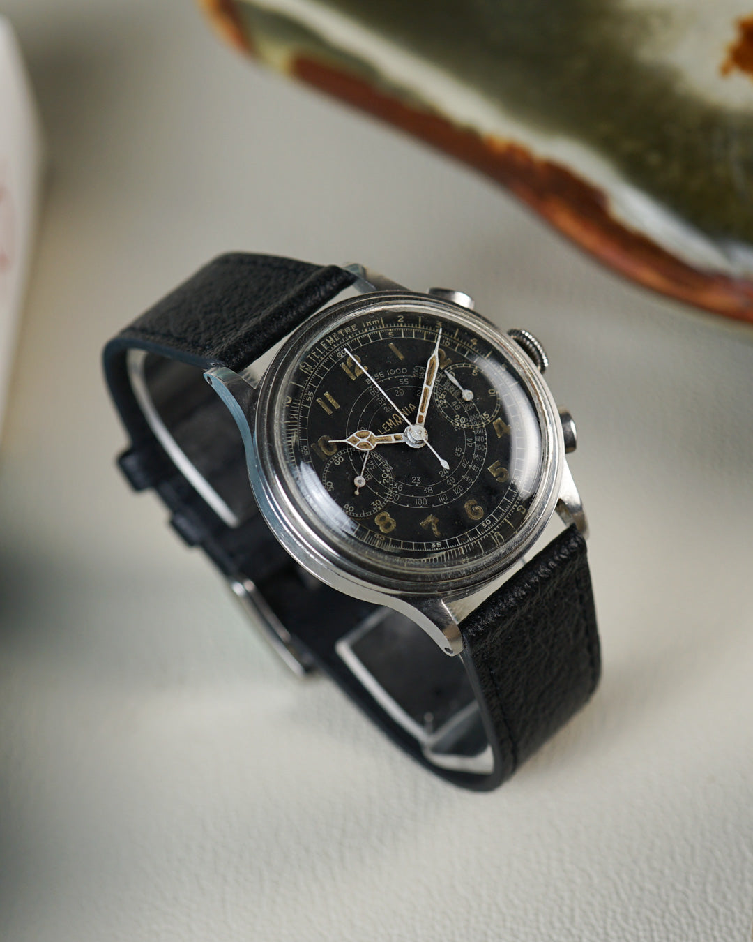 Chronographe Lemania – cadran tachymètre en colimaçon au radium, calibre 15TL
