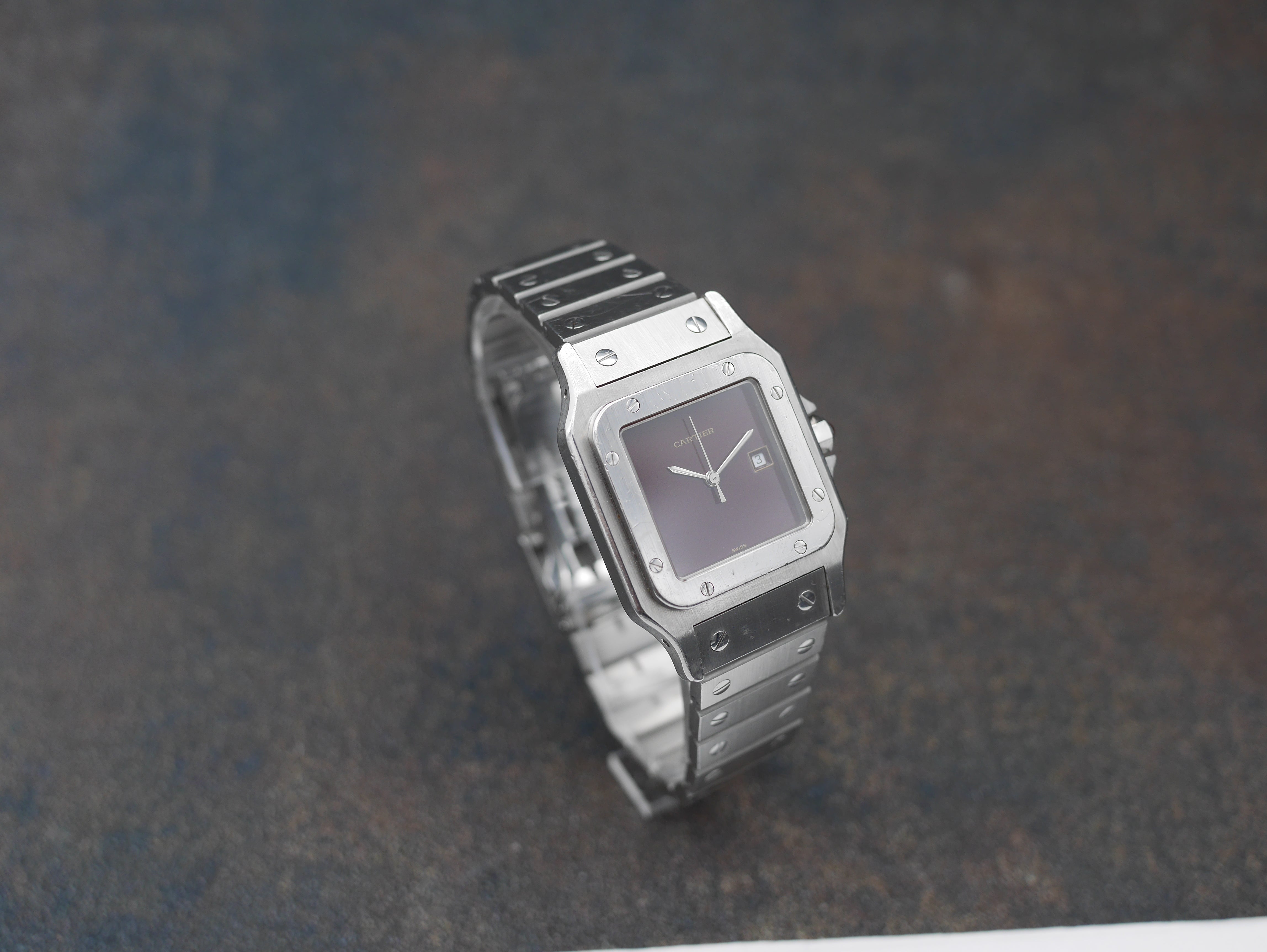 1980s Cartier Santos Stainless steel and its rare "bordeaux" dial and saphyr