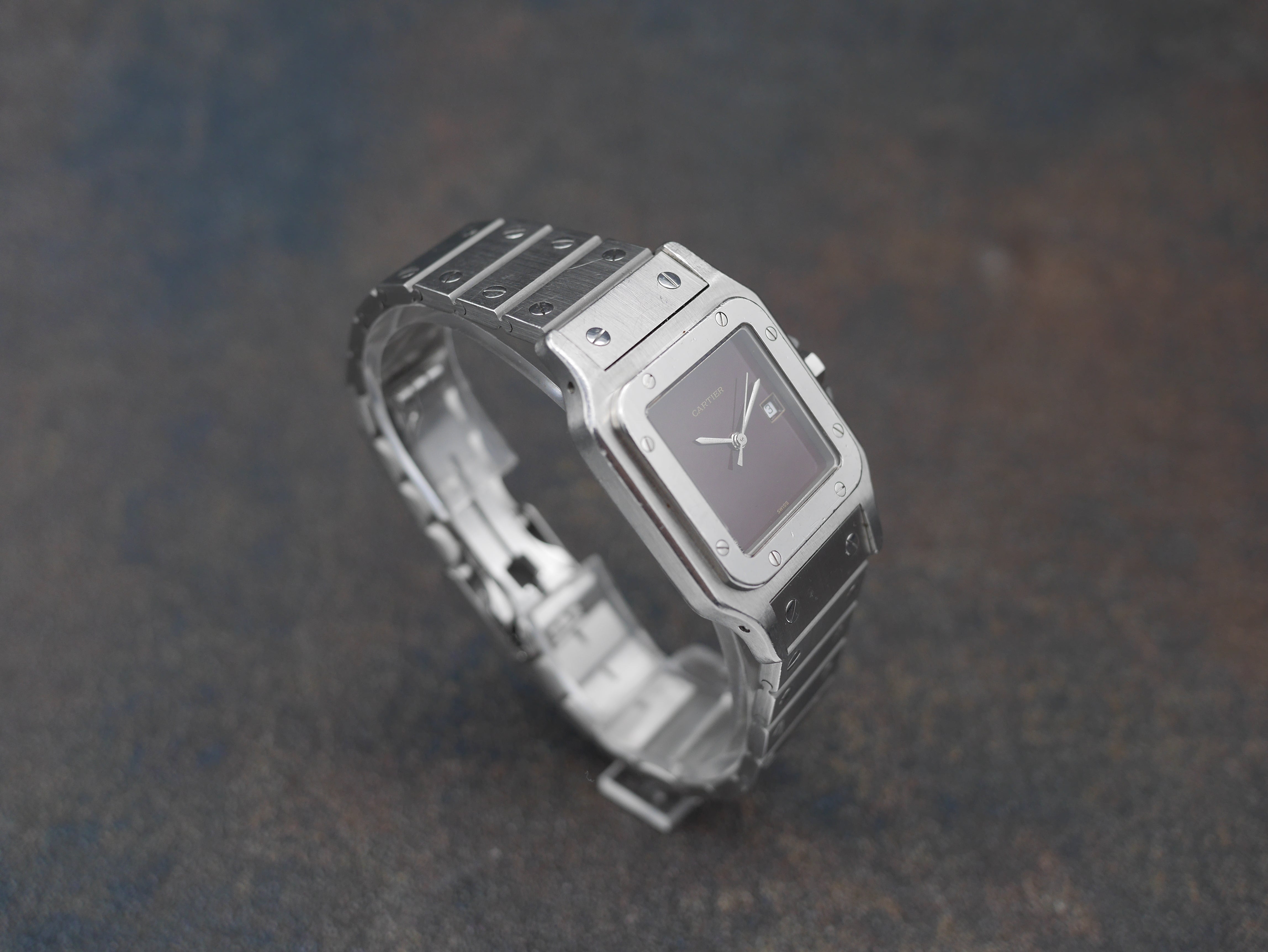 1980s Cartier Santos Stainless steel and its rare "bordeaux" dial and saphyr