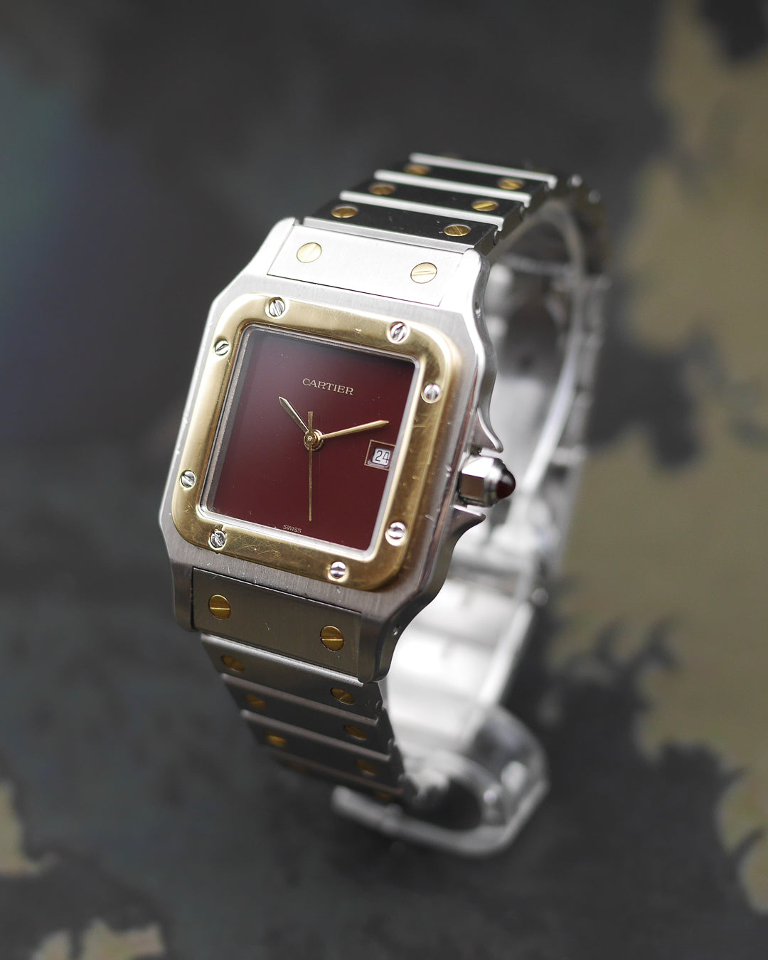 1980s Cartier Santos yellow gold & steel and its rare "bordeaux" dial and saphyr