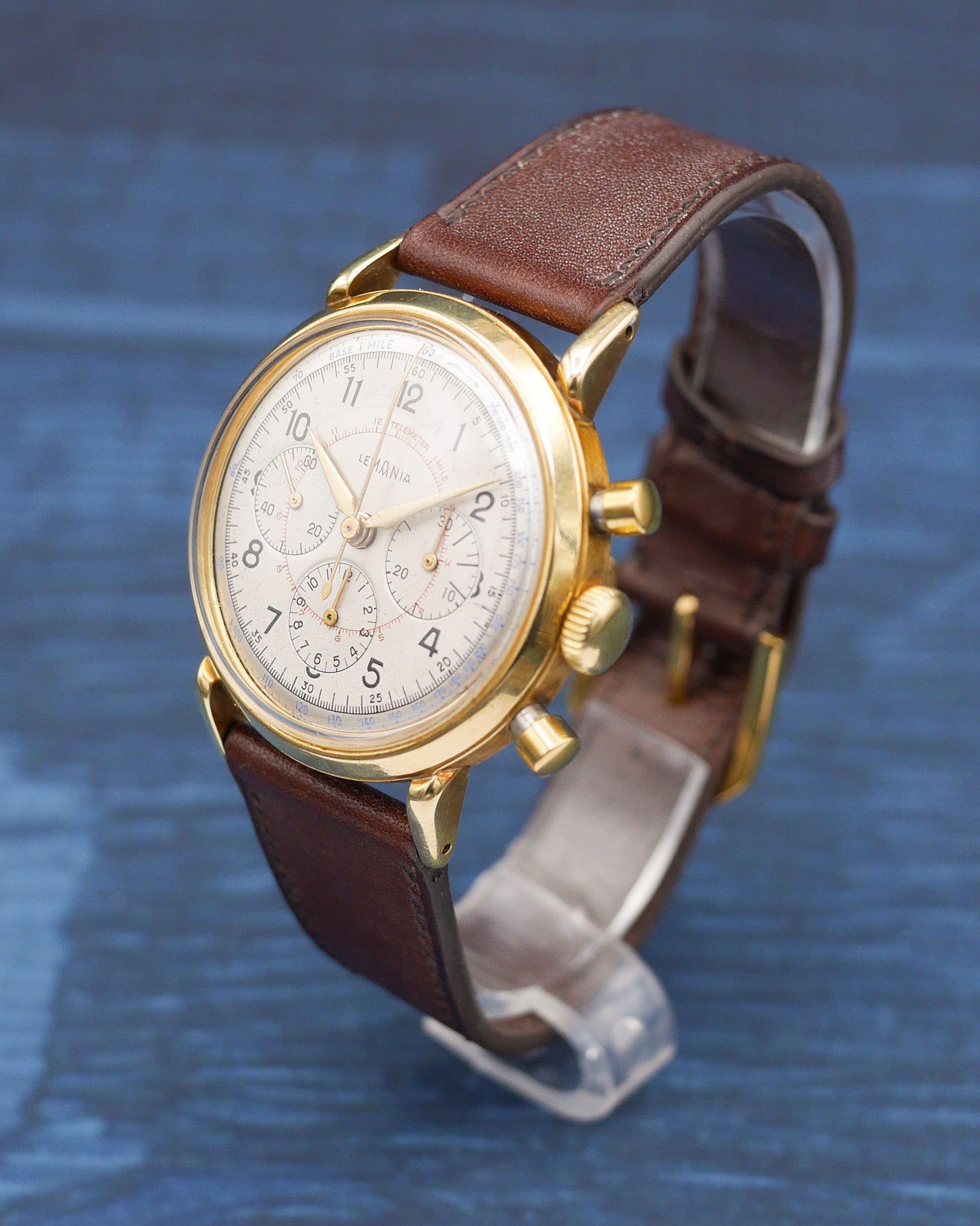 1950s Lemania chronograph dual tone dial in yellow gold