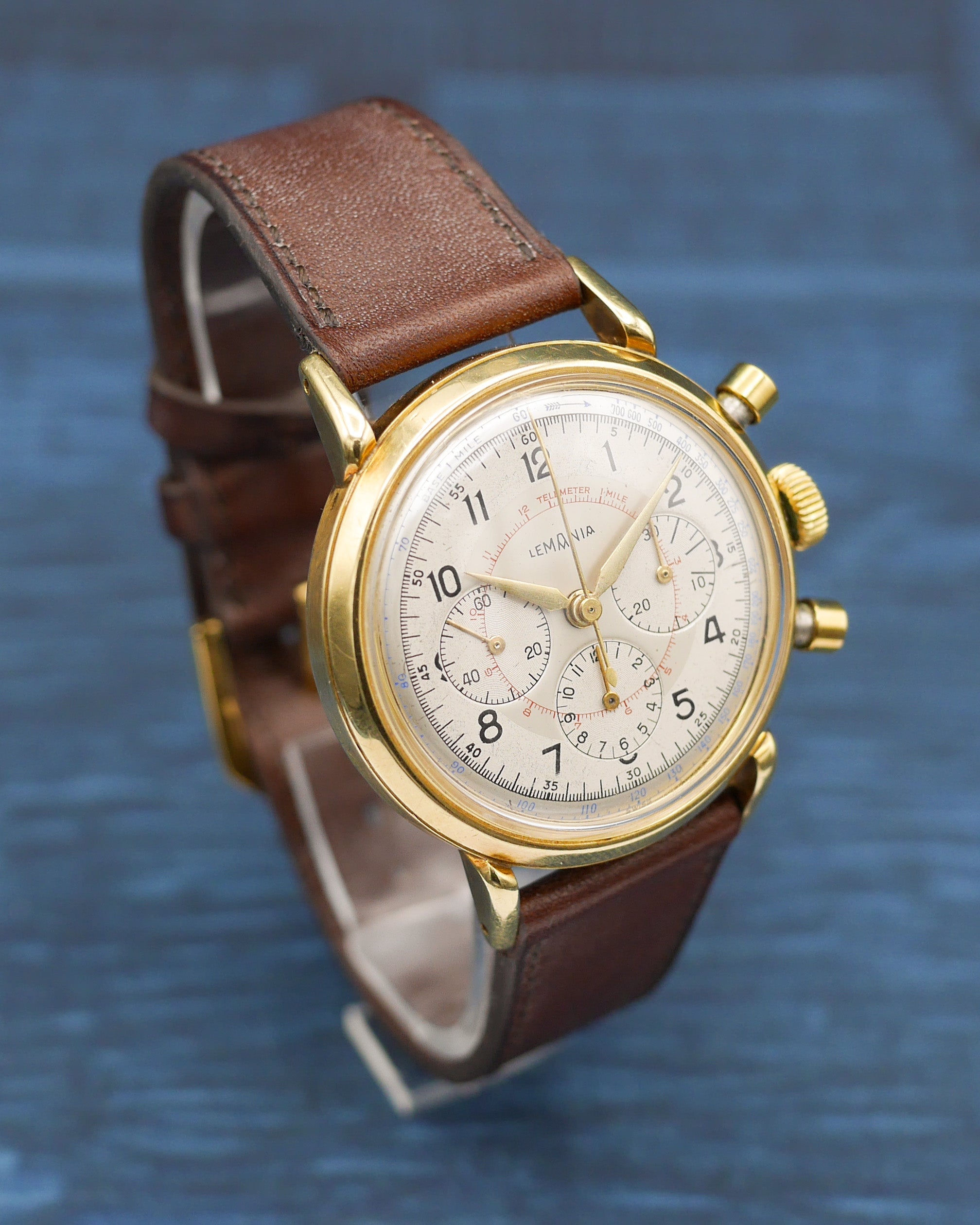 1950s Lemania chronograph dual tone dial in yellow gold