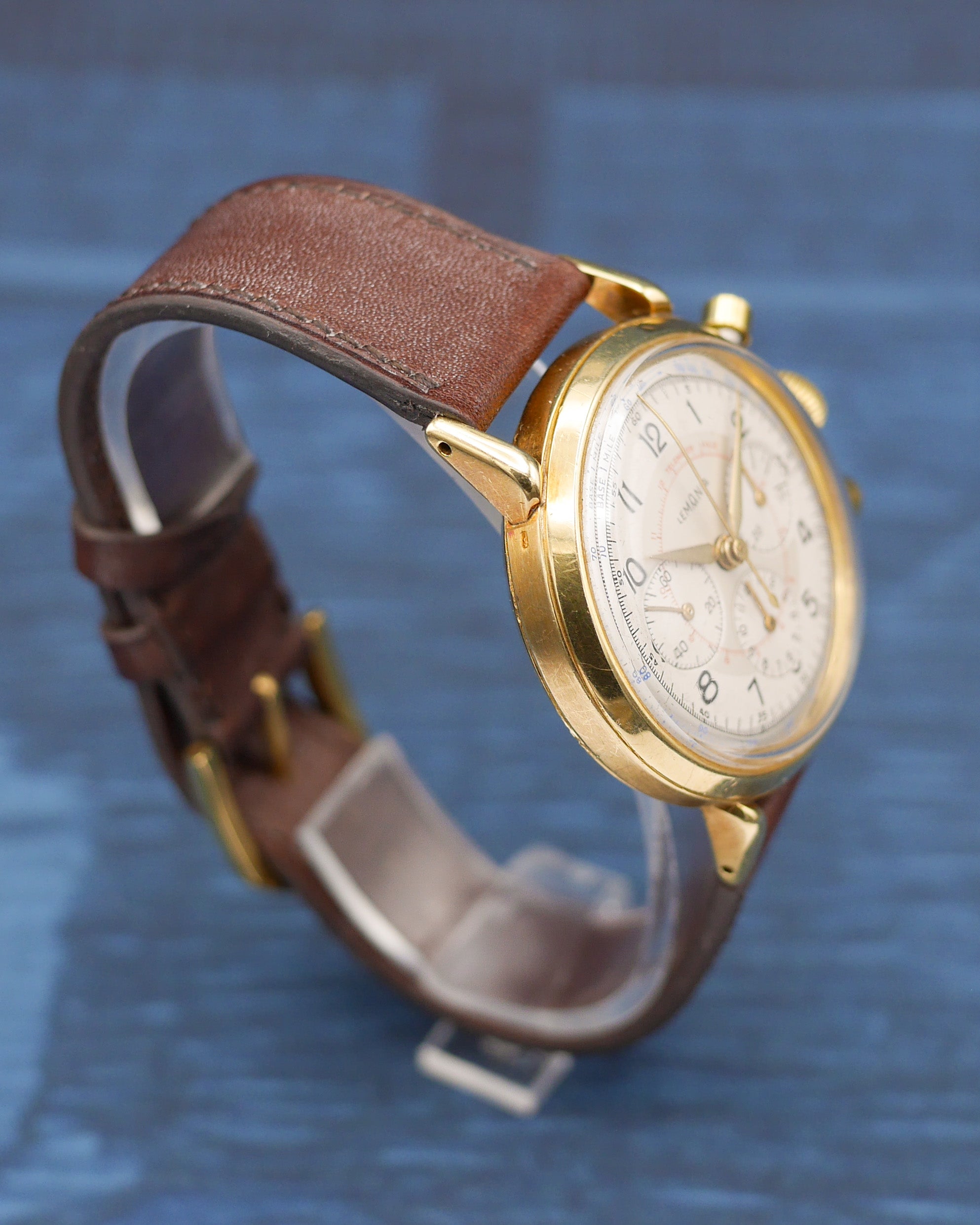 1950s Lemania chronograph dual tone dial in yellow gold
